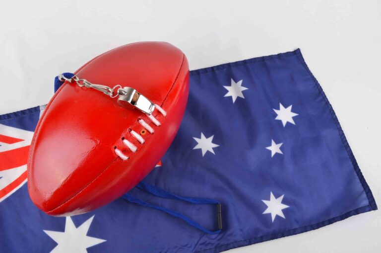 Football on top of Australian flag